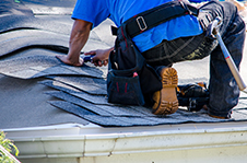 Roofing repair work in progress